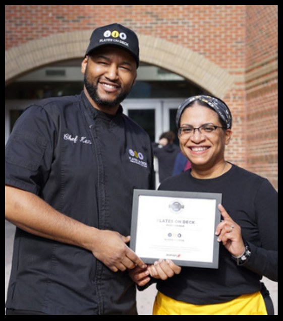 Chef Ken and Ziomara accepting Aramark's Best of Local Restaurant Row 2025 Most Unique Award